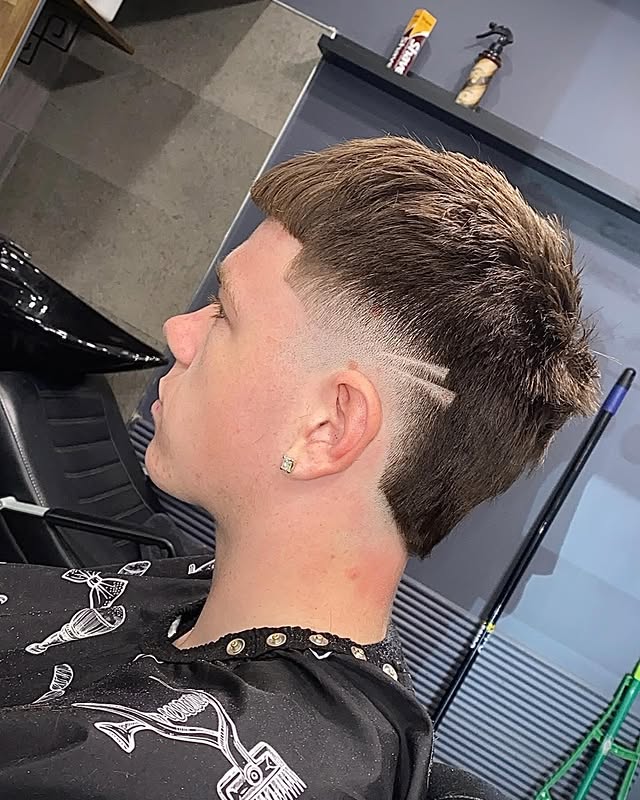 Textured crop with mid skin fade and line-up